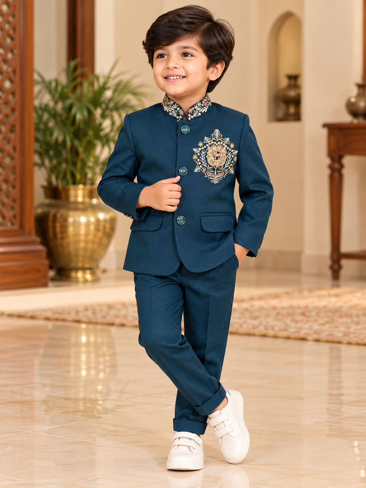 Boys teal blue crest embroidered bandhgala suit with matching trousers, front view